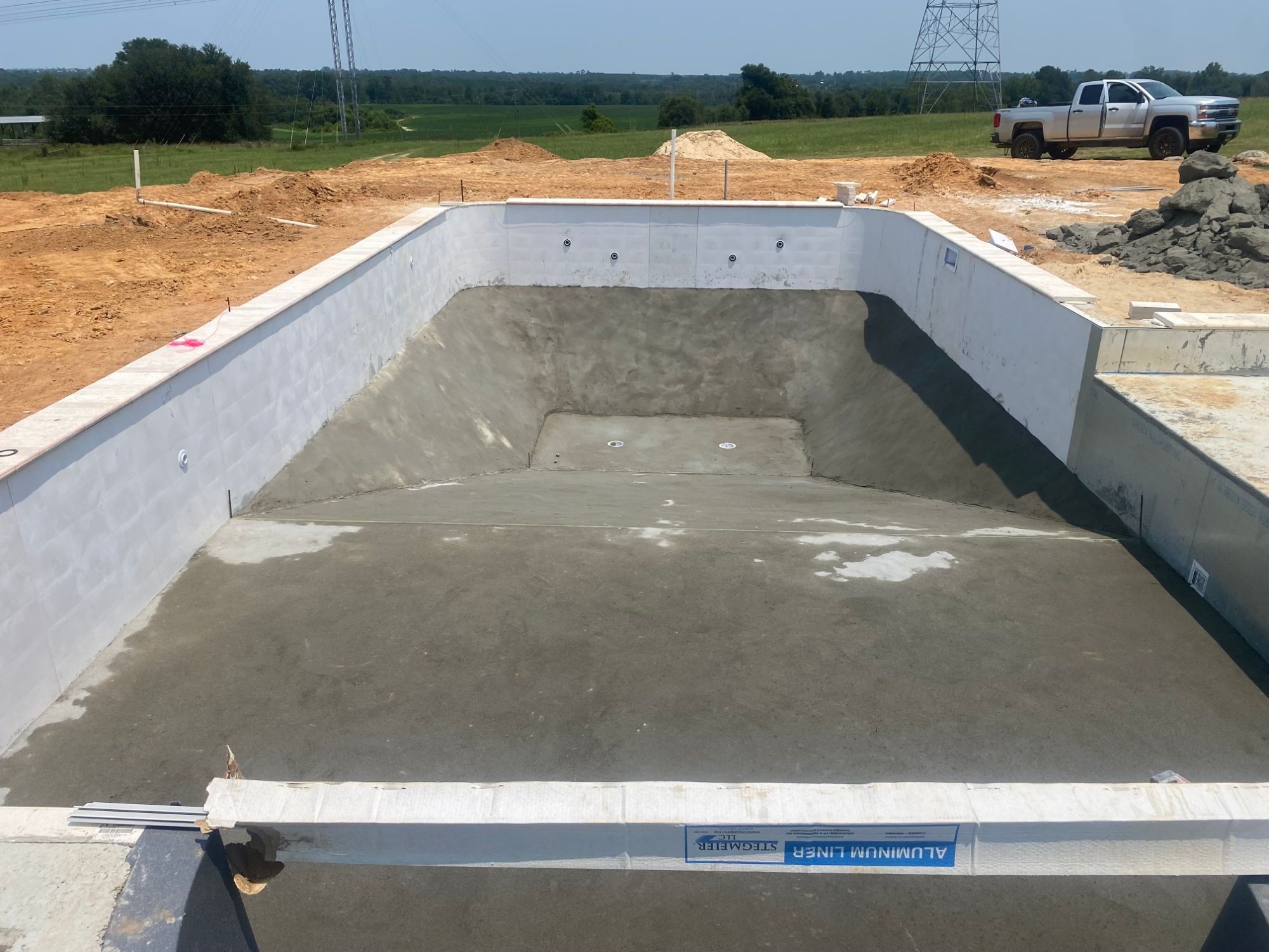 Vinyl pool liner wall panel installation
